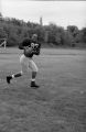 Larry Hubbard catches the football, 1959