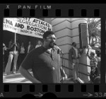 Former L.A. Rams player, Roosevelt Grier speaking against school busing cutback in Pasadena, Calif., 1974