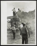 [Farmers loading hay into a truck, Spain]