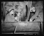 Bethlehem-Fairfield shipyards, Baltimore, Maryland. Negro women working as chippers, removing beads after a joint has been welded