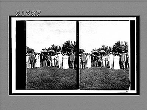 Group of men and women, standing in line. Active no. 7864 : stereo interpositive.