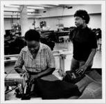 Dorothy Robertson and Martha Thomas, employees of the Fine Vines sewing company, undated