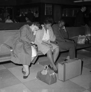 Freedom Riders asleep on a bench at the Greyhound bus station in Birmingham, Alabama.