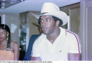 Photograph of Tony Dorsett in a rancher's hat