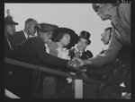 Production. Launching of the SS Booker T. Washington. Mrs. Mary McLeod Bethune, Director of Negro Affairs, National Youth Administration (NYA); Marian Anderson, celebrated contralto; and Dr. William J. Thompkins, Recorder of Deeds, Washington, D.C., congratulate Negro workmen who helped construct the SS Booker T. Washington, first Liberty Ship named for a Negro