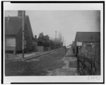 [Houses along unpaved street in Georgia]