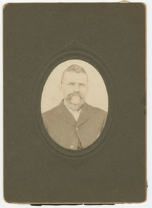 Thumbnail for Photograph of a man with a mustache wearing a dark jacket