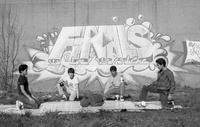 Breakdancers pose in front of Finals graffiti mural, Hartford, 1984