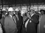 David S. Cunningham, Jr. and others talking at a construction site., Los Angeles, 1984