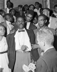 Fred Shuttlesworth leaving New Hope Baptist Church in Birmingham, Alabama.