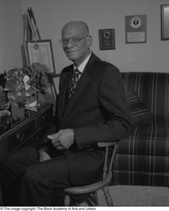 Floyd F. Wilkerson seated for his portrait