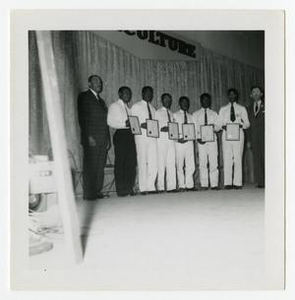 Men Holding Certificates