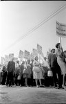 [Demonstrators marching in the street holding signs during the March on Washington, 1963]