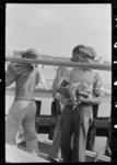 [Untitled photo, possibly related to: Negro stevedores handling lumber in unloading process, unloading the "El Rito," Pilottown, Louisiana]