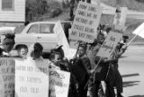 Protestors picketing during the arrival of Vice President Hubert Humphrey at the airport in Birmingham, Alabama.