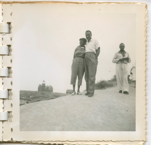 Digital image of Taylor family members by a lighthouse on Martha's Vineyard