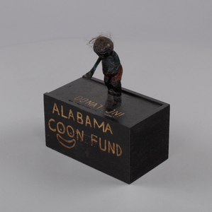 Donation box and lid with a carving for the "Alabama Coon Fund"