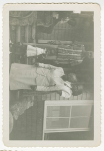 Digital image of men and women at the Taylor family home on Martha's Vineyard