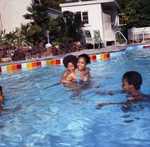 Iris Gordy and children in the pool at Berry Gordy's party, Los Angeles