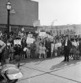 Supporters and protestors greeting Lady Bird Johnson in Mobile, Alabama, during the 1964 presidential campaign.