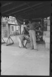 [Untitled photo, possibly related to: Negro boy drawing on the sidewalk, New Iberia, Louisiana]