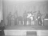 Bobby Moore and the Rhythm Aces performing on stage at the Laicos Club in Montgomery, Alabama.