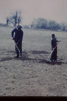 Father and son working on the land