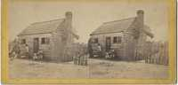 African Americans Outside of a One-Room Cabin