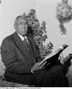 Photograph of Arthur Vance Voice holding Bible #2