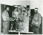 Pvt. Eugene Johnson of Fort Sheridan Reception Center, with his painting depicting the American Negroes' part in the war effort