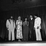 Thumbnail for Miss Black America Beauty Pageant performers The 5th Dimension standing on stage, Atlantic City, 1972