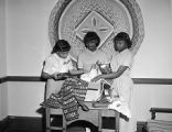 Concordia Club, Girls at YWCA unpacking articles, 1950