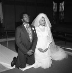 Bride and Groom kneeling, Los Angeles, 1972