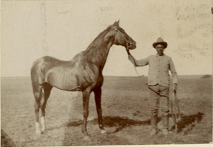 Hector Bazy with bareback horse