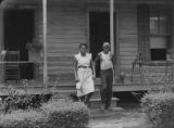 Prisoner leaving his home in Phenix City, Alabama, on his way to report to the prison.