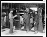 [Four Afro-American U.S. Civilian Conservation Corps enrollees working in supplies, Kentucky]