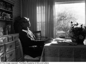 Photograph of Rev. James Garfield Owens in his dinging room #2