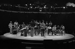 CAA orchestra on a round stage - front view