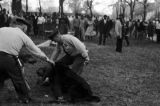 Police dogs attacking a civil rights demonstrator during a protest in Kelly Ingram Park in Birmingham, Alabama.