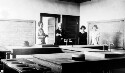 Cooking room Woodland School. Mrs. Ferguson County Superintendent and daughters. Bludworth