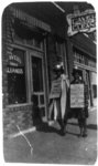 [Two African American women picketing a theatre. Their signs read "This theatre violates the morals of womanhood" and "This theatre insults our mothers", Oklahoma City?]