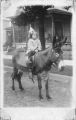 Young Marcella Fitzgerald Killen Riding a Donkey