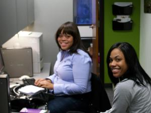 Two women at a desk