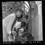 Thumbnail for African American boys from Markham Junior High School gardening at Watts Towers, Los Angeles, Calif., 1965