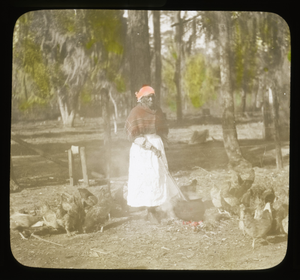 Middleton Place: women stirring a kettle outside; possibly Annette Mayes, born a slave and lived as a free woman at Middleton Place until the 1930s.