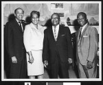 Three African American men and a woman pose in formal dress, Los Angeles, ca. 1951-1960