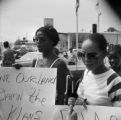 Civil rights activists Rachel Nelson and Sheyann Webb demonstrating at a Ku Klux Klan march in Selma, Alabama.