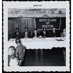 "Boy of the Year," Oswald Gooden seated at the head table with his father and other guests at the award ceremony