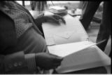 Margaret Walker Alexander with letters, Donald Gallup, in office at Beincke Library at Yale University, 1978.(YSP 25-78-4)