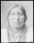 Eagle House of Ogalala Sioux, wearing button of Buffalo Bill 1904